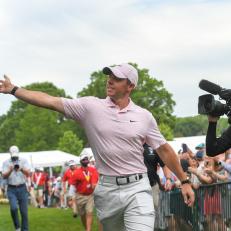 CHARLOTTE, NC - MAY 09: Rory McIlroy of Northern Ireland high fives fans while walking towards the clubhouse after the final round of the Wells Fargo Championship at Quail Hollow Club on May 9, 2021 in Charlotte, North Carolina. (Photo by Ben Jared/PGA TOUR via Getty Images)