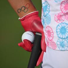 EVIAN-LES-BAINS, FRANCE - JULY 24: The Olympic tatoo and red golf glove of Lexi Thompson of USA during the pro - am prior to the start of The Evian Championship at the Evian Resort Golf Club on July 24, 2019 in Evian-les-Bains, France. (Photo by Stuart Franklin/Getty Images)