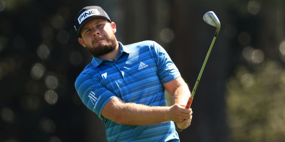 AUGUSTA, GEORGIA - APRIL 05: Tyrrell Hatton of England plays a shot on the 18th hole during a practice round prior to the Masters at Augusta National Golf Club on April 05, 2021 in Augusta, Georgia. (Photo by Mike Ehrmann/Getty Images)