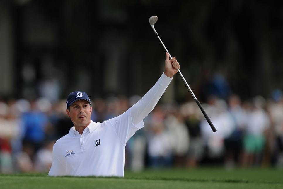 HILTON HEAD ISLAND, SC - APRIL 20:  Matt Kuchar celebrates on the 18th green during the final round of the RBC Heritage at Harbour Town Golf Links on April 20, 2014 in Hilton Head Island, South Carolina.  (Photo by Maddie Meyer/Getty Images)