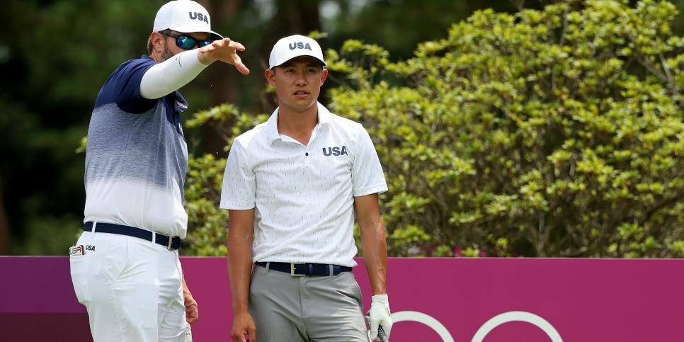 TOKYO, JAPAN - JULY 26: Collin Morikawa of Team USA practices with caddie J.J. Jakovac at Kasumigaseki Country Club ahead of the Tokyo Olympic Games on July 26, 2021 in Tokyo, Japan. (Photo by Mike Ehrmann/Getty Images)