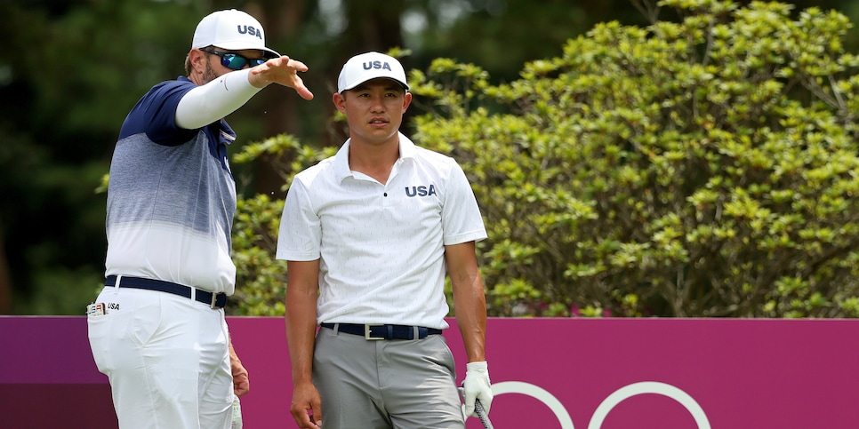 TOKYO, JAPAN - JULY 26: Collin Morikawa of Team USA practices with caddie J.J. Jakovac at Kasumigaseki Country Club ahead of the Tokyo Olympic Games on July 26, 2021 in Tokyo, Japan. (Photo by Mike Ehrmann/Getty Images)