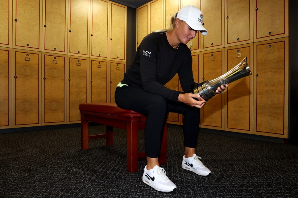 CARNOUSTIE, SCOTLAND - AUGUST 22: Champion, Anna Nordqvist of Sweden poses with the AIG Women's Open trophy in the locker room following Day Four of the AIG Women's Open at Carnoustie Golf Links on August 22, 2021 in Carnoustie, Scotland. (Photo by Warren Little/R&A/R&A via Getty Images)