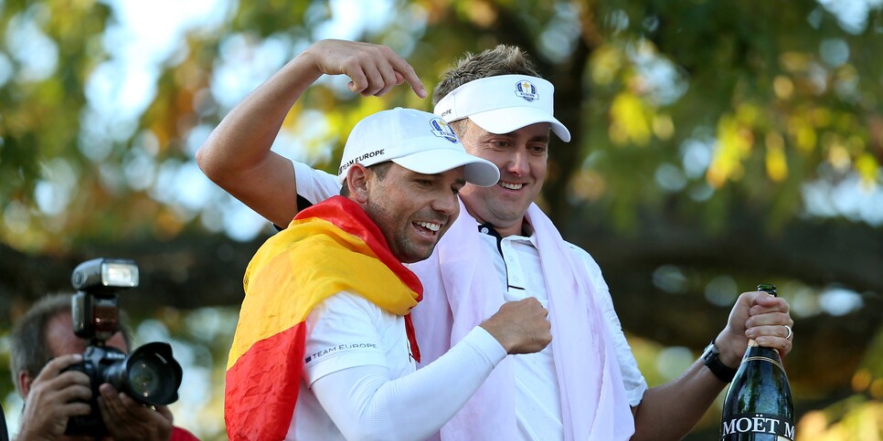 MEDINAH, IL - SEPTEMBER 30:  Sergio Garcia and Ian Poulter of Europe celebrate after helping their team defeat the United States for The 39th Ryder Cup at Medinah Country Club on September 30, 2012 in Medinah, Illinois.  (Photo by Andy Lyons/Getty Images)