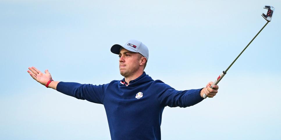 SHEBOYGAN, WI - SEPTEMBER 24:  Justin Thomas raises his arms and putter as he celebrates making an eagle putt on the 16th hole green during Friday Afternoon Four-ball Matches of the 43rd Ryder Cup at Whistling Straits on September 24, 2021 in Sheboygan, Wisconsin. (Photo by Keyur Khamar/PGA TOUR via Getty Images)