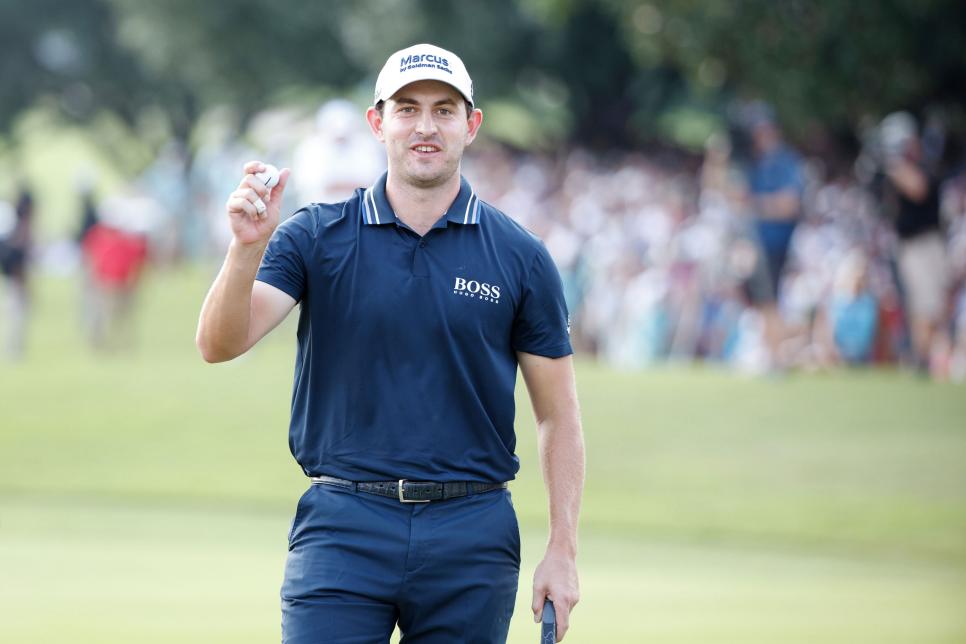 ATLANTA, GEORGIA - SEPTEMBER 05: Patrick Cantlay of the United States celebrates on the 18th green after winning during the final round of the TOUR Championship at East Lake Golf Club on September 05, 2021 in Atlanta, Georgia. (Photo by Cliff Hawkins/Getty Images)