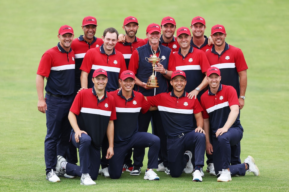 KOHLER, WISCONSIN - SEPTEMBER 26: Team United States celebrates with the Ryder Cup after defeating Team Europe 19 to 9 during the 43rd Ryder Cup at Whistling Straits on September 26, 2021 in Kohler, Wisconsin. (Photo by Richard Heathcote/Getty Images)