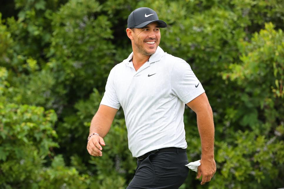 JERSEY CITY, NJ - AUGUST 21:  Brooks Koepka of the United States smiles the 2nd tee during round 3 of the Northern Trust golf tournament on August 21, 2021 at Liberty National Golf Club in Jersey City, NJ.   (Photo by Rich Gra essle/Icon Sportswire via Getty Images)