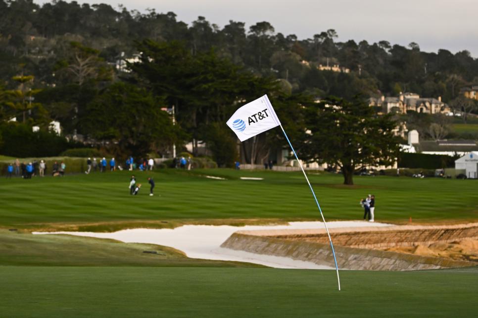 PEBBLE BEACH, CALIFORNIA - FEBRUARY 02: A view of the pin flag being blown by the wind at the 18th hole during the first round of the AT&T Pebble Beach Pro-Am at Pebble Beach Golf Links on February 2, 2023 in Pebble Beach, California. (Photo by Tracy Wilcox/PGA TOUR via Getty Images)
