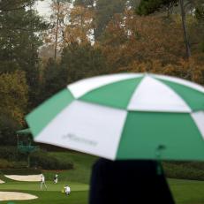 AUGUSTA, GEORGIA - NOVEMBER 11: Rickie Fowler of the United States putts in the rain on the 12th green during a practice round prior to the Masters at Augusta National Golf Club on November 11, 2020 in Augusta, Georgia. (Photo by Patrick Smith/Getty Images)