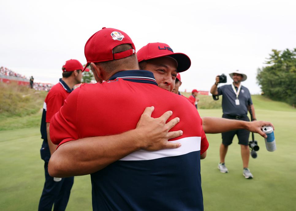 KOHLER, WISCONSIN - SEPTEMBER 26: Bryson DeChambeau of team United States and Xander Schauffele of team United States celebrate their win over Team Europe during Sunday Singles Matches of the 43rd Ryder Cup at Whistling Straits on September 26, 2021 in Kohler, Wisconsin. (Photo by Patrick Smith/Getty Images)