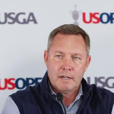 BROOKLINE, MASSACHUSETTS - JUNE 15: Mike Whan, CEO of the USGA, speaks to the media at a press conference during a practice round prior to the 122nd U.S. Open Championship at The Country Club on June 15, 2022 in Brookline, Massachusetts. (Photo by Rob Carr/Getty Images)