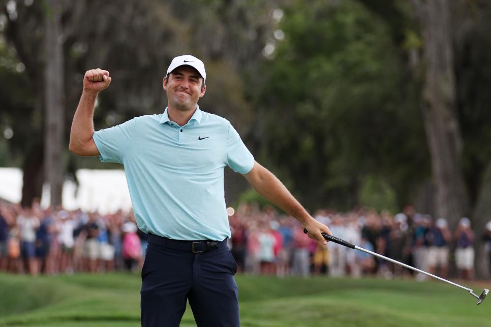 PONTE VEDRA BEACH, FLORIDA - MARCH 12: Scottie Scheffler of the United States celebrates after making his putt to win on the 18th green during the final round of THE PLAYERS Championship on THE PLAYERS Stadium Course at TPC Sawgrass on March 12, 2023 in Ponte Vedra Beach, Florida. (Photo by Richard Heathcote/Getty Images)