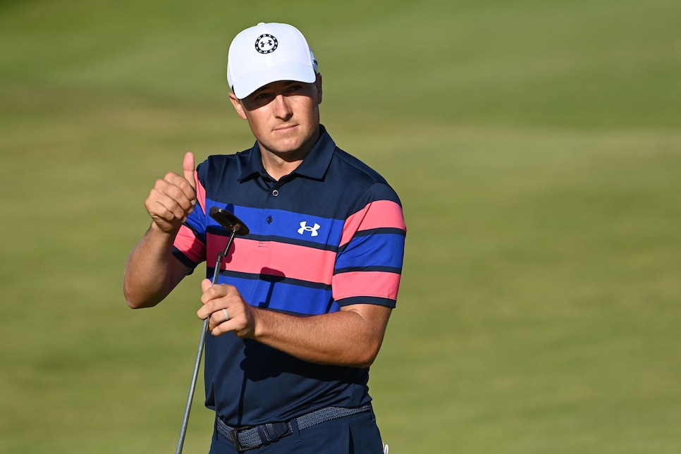 US golfer Jordan Spieth acknowledges the crowd on the 18th green during his final round on day 4 of The 149th British Open Golf Championship at Royal St George's, Sandwich in south-east England on July 18, 2021. - RESTRICTED TO EDITORIAL USE (Photo by Paul ELLIS / AFP) / RESTRICTED TO EDITORIAL USE (Photo by PAUL ELLIS/AFP via Getty Images)