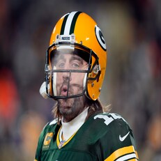 GREEN BAY, WISCONSIN - JANUARY 02:  Quarterback Aaron Rodgers #12 of the Green Bay Packers warms up prior to the game against the Minnesota Vikings at Lambeau Field on January 02, 2022 in Green Bay, Wisconsin. (Photo by Patrick McDermott/Getty Images)