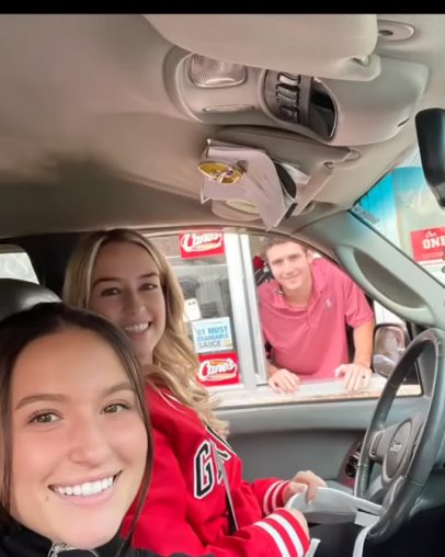 Stetson Bennett continues to cement legend status by slinging chicken tenders from a Raising Cane's drive-thru