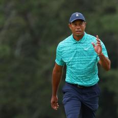 AUGUSTA, GEORGIA - APRIL 08: Tiger Woods waves to the crowd as he walks to the 18th green during the second round of The Masters at Augusta National Golf Club on April 08, 2022 in Augusta, Georgia. (Photo by Andrew Redington/Getty Images)