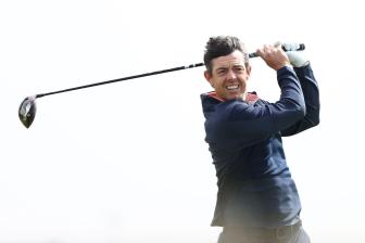 Rory McIlroy likely to play weekend in Abu Dhabi after late birdie during wild, windy round