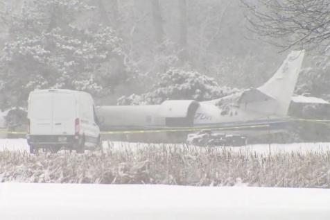 Plane crash-lands on snowy Wisconsin golf course, three people and 53 dogs onboard safe