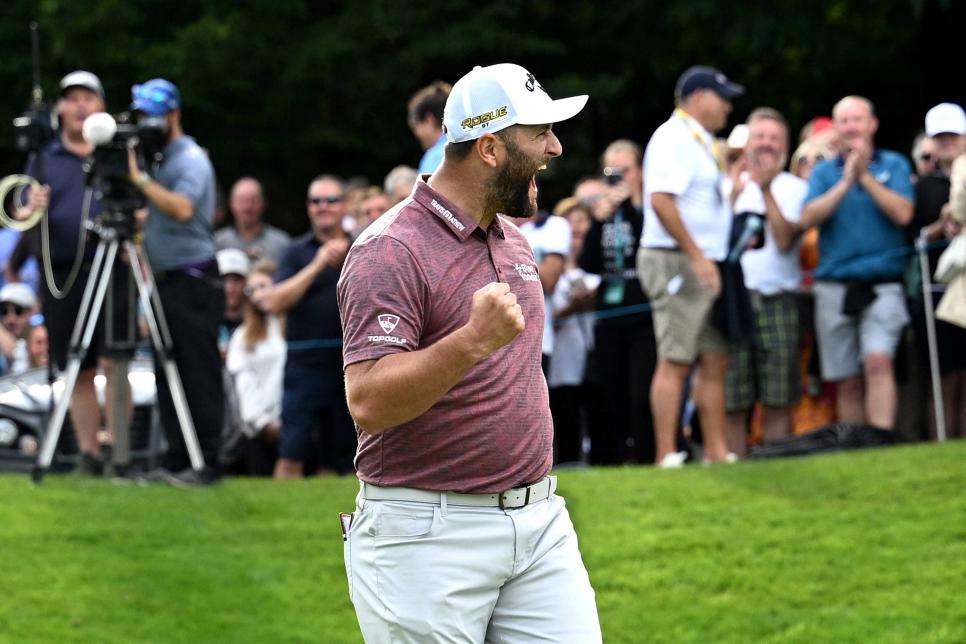 VIRGINIA WATER, ENGLAND - SEPTEMBER 11: John Rahm of Spain celebrates after sinking an eagle putt on the 18th hole during Round Three on Day Four of the BMW PGA Championship at Wentworth Golf Club on September 11, 2022 in Virginia Water, England. (Photo by Octavio Passos/Getty Images)