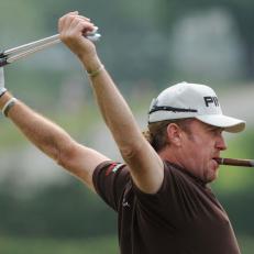 Cigar smoking Miguel Angel Jimenez stretching before starting during round three of the Celtic Manor Wales Open at Celtic Manor, Newport.   (Photo by Barry Batchelor/PA Images via Getty Images)