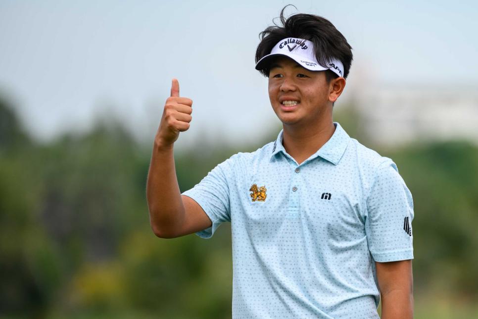 TK Chantananuwat of Thailand gives a thumbs up on the 8th tee during a practice round ahead of the 2022 Asia-Pacific Amateur Championship being played at the Amata Spring Country Club in Thailand on Wednesday, October 26, 2022. Photograph by AAC