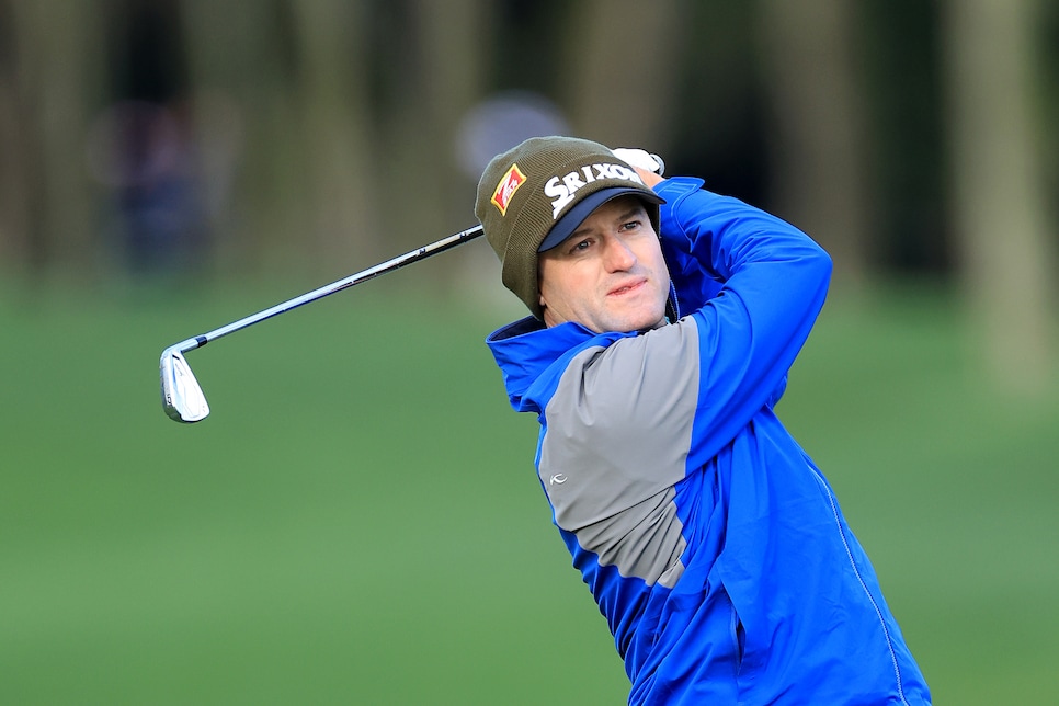 PONTE VEDRA BEACH, FLORIDA - MARCH 13: Russell Knox of Scotland plays his second shot on the par 4, seventh hole during the weather delayed completion of the second round of THE PLAYERS Championship at TPC Sawgrass on March 13, 2022 in Ponte Vedra Beach, Florida. (Photo by David Cannon/Getty Images)