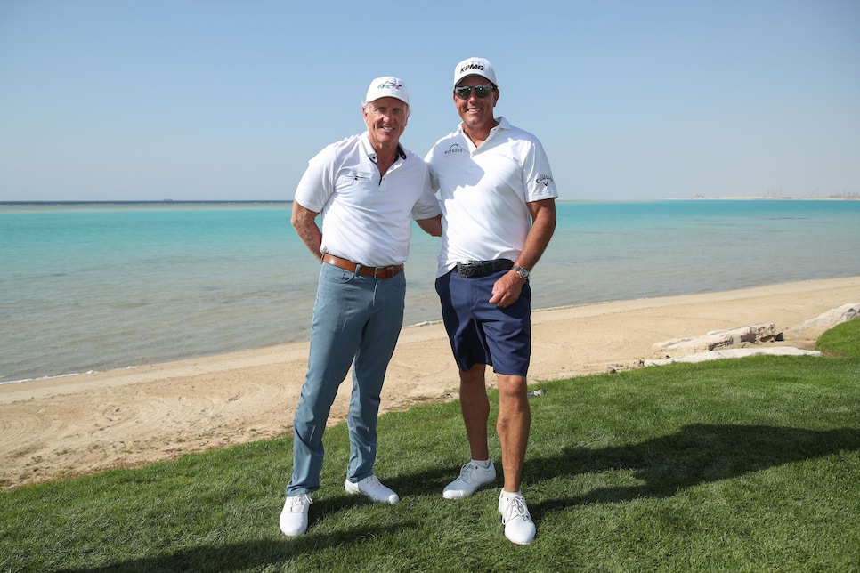 AL MUROOJ, SAUDI ARABIA - FEBRUARY 02: Phil Mickelson of USA and Greg Norman, CEO of Liv Golf Investments interact during a practice round prior to the PIF Saudi International at Royal Greens Golf & Country Club on February 02, 2022 in Al Murooj, Saudi Arabia. (Photo by Luke Walker/WME IMG/WME IMG via Getty Images)