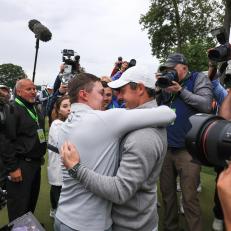 BROOKLINE, MASSACHUSETTS - JUNE 19: Matthew Fitzpatrick of England is congratulated by Rory McIlroy of Northern Ireland after Fitzpatrick had won on the 18th hole during the final round of the 2022 U.S.Open at The Country Club on June 19, 2022 in Brookline, Massachusetts. (Photo by David Cannon/Getty Images)
