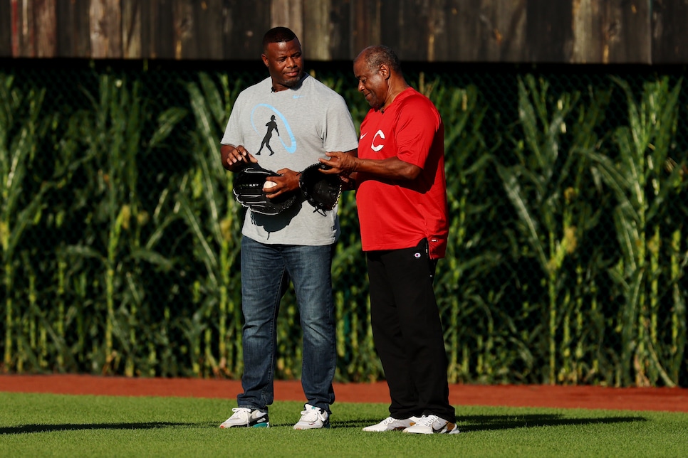 Ken Griffey Jr. #24 of the Seattle Mariners poses with his father