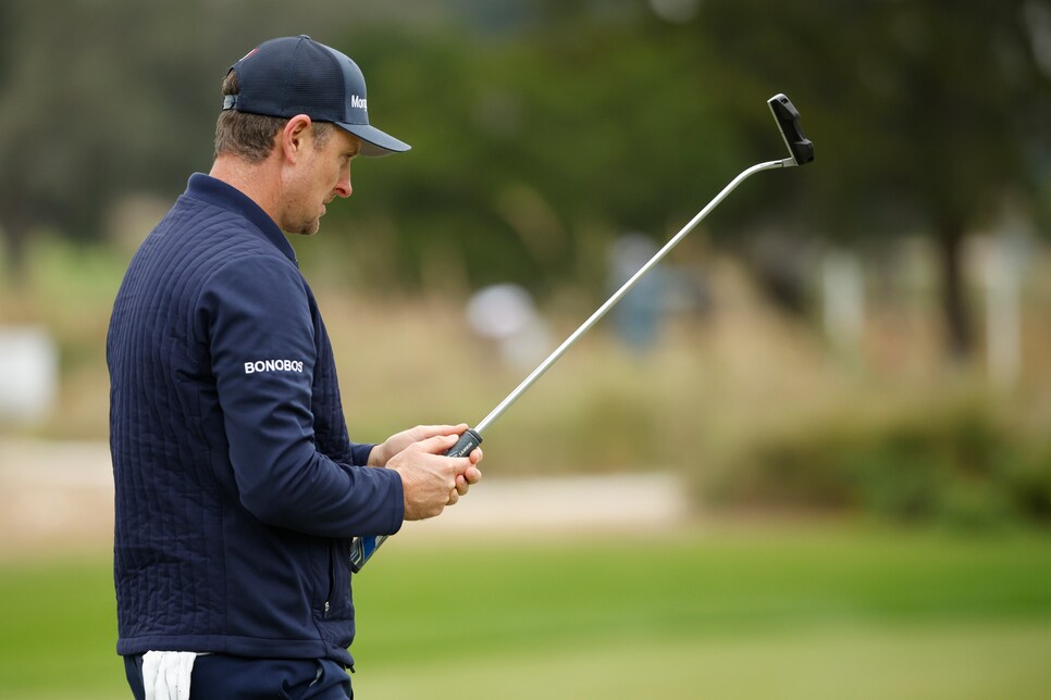 ST SIMONS ISLAND, GEORGIA - NOVEMBER 20: Justin Rose of England lines up a putt on the 18th green at Sea Island Resort Seaside Course on November 20, 2022 in St Simons Island, Georgia. (Photo by Cliff Hawkins/Getty Images)