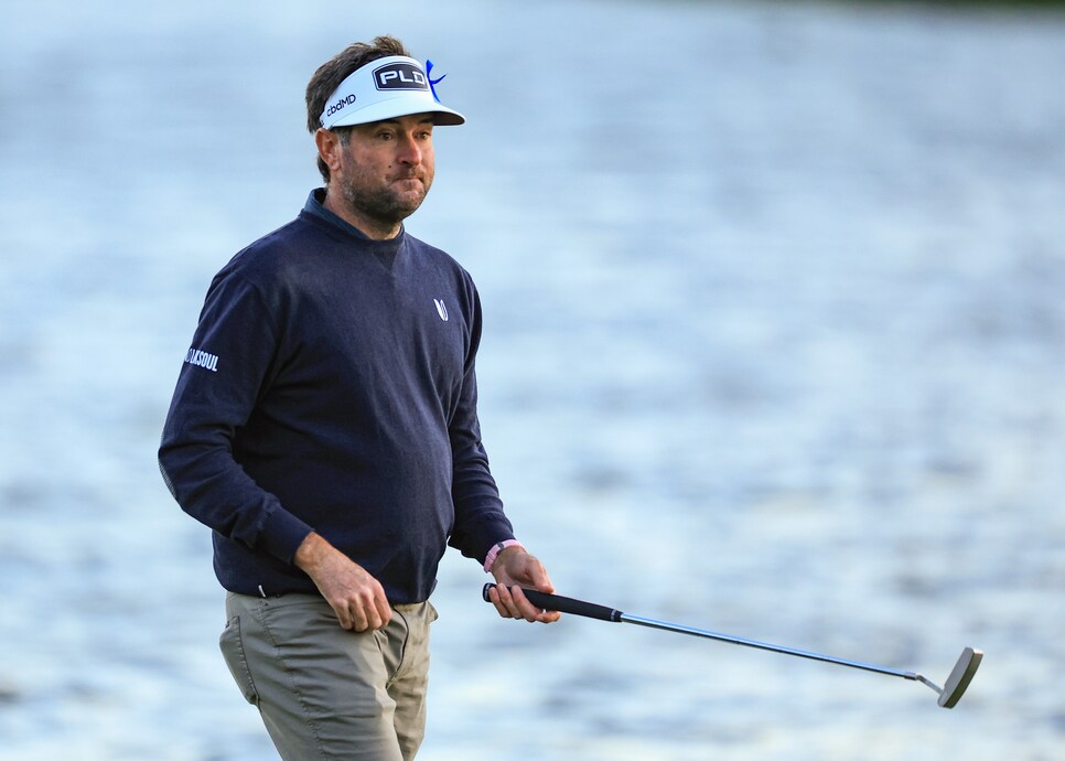 PONTE VEDRA BEACH, FLORIDA - MARCH 12: Bubba Watson of The United States walks to the green after his second shot on the par 4, 18th hole during the rain delayed completion of the second round of THE PLAYERS Championship at TPC Sawgrass on March 12, 2022 in Ponte Vedra Beach, Florida. (Photo by David Cannon/Getty Images)