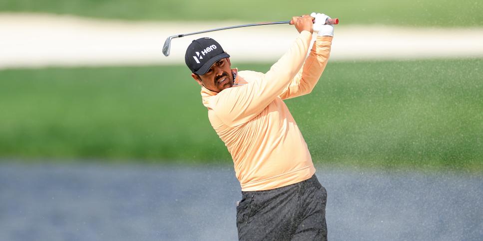 PONTE VEDRA BEACH, FLORIDA - MARCH 13: Anirban Lahiri of India plays his second shot on the par 4, seventh hole during the weather delayed completion of the second round of THE PLAYERS Championship at TPC Sawgrass on March 13, 2022 in Ponte Vedra Beach, Florida. (Photo by David Cannon/Getty Images)