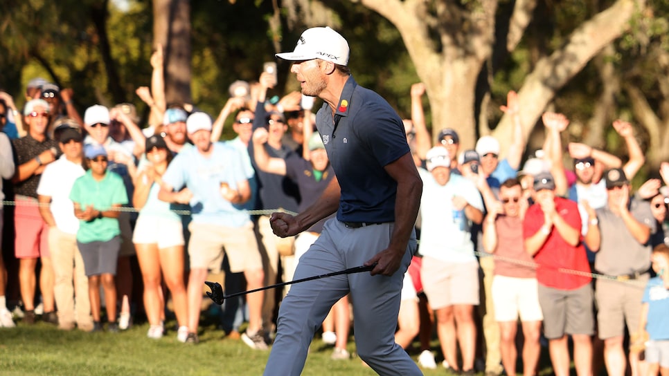 PALM HARBOR, FLORIDA - MARCH 20: Sam Burns of the United States reacts to his winning putt on the 16th green during a playoff in the final round of the Valspar Championship on the Copperhead Course at Innisbrook Resort and Golf Club on March 20, 2022 in Palm Harbor, Florida. (Photo by Douglas P. DeFelice/Getty Images)