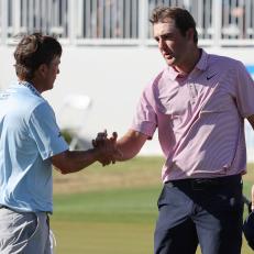 AUSTIN, TEXAS - MARCH 27: Scottie Scheffler of the United States shakes hands with Kevin Kisner of the United States on the 15th green after defeating him 4&3 in their finals match to win the World Golf Championships-Dell Technologies Match Play at Austin Country Club on March 27, 2022 in Austin, Texas. (Photo by Gregory Shamus/Getty Images)