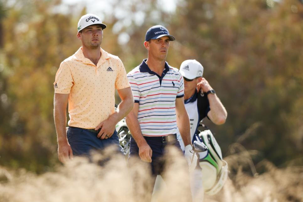 NAPLES, FLORIDA - DECEMBER 11: Sam Burns of the United States and Billy Horschel of the United States walk from the fourth tee during the second round of the QBE Shootout at Tiburon Golf Club on December 11, 2021 in Naples, Florida. (Photo by Cliff Hawkins/Getty Images)