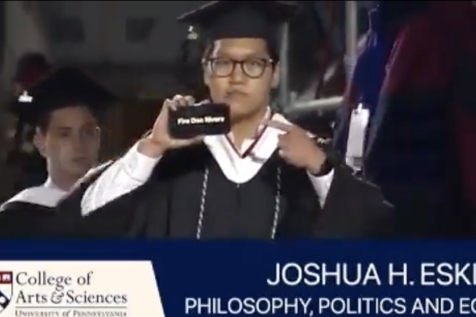 Penn student holds up “Fire Doc Rivers” sign during graduation walk, might be the most Sixers Sixers fan ever