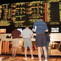 LAS VEGAS, NEVADA - MARCH 18: Sports betting guests to Caesars Palace Race & Sports Book can watch multiple big-screens with different games, plus horse and dog racing at the same time while placing and monitoring bets, March 18, 2004 in Las Vegas, Nevada. (Photo by Getty Images/Bob Riha, Jr.)