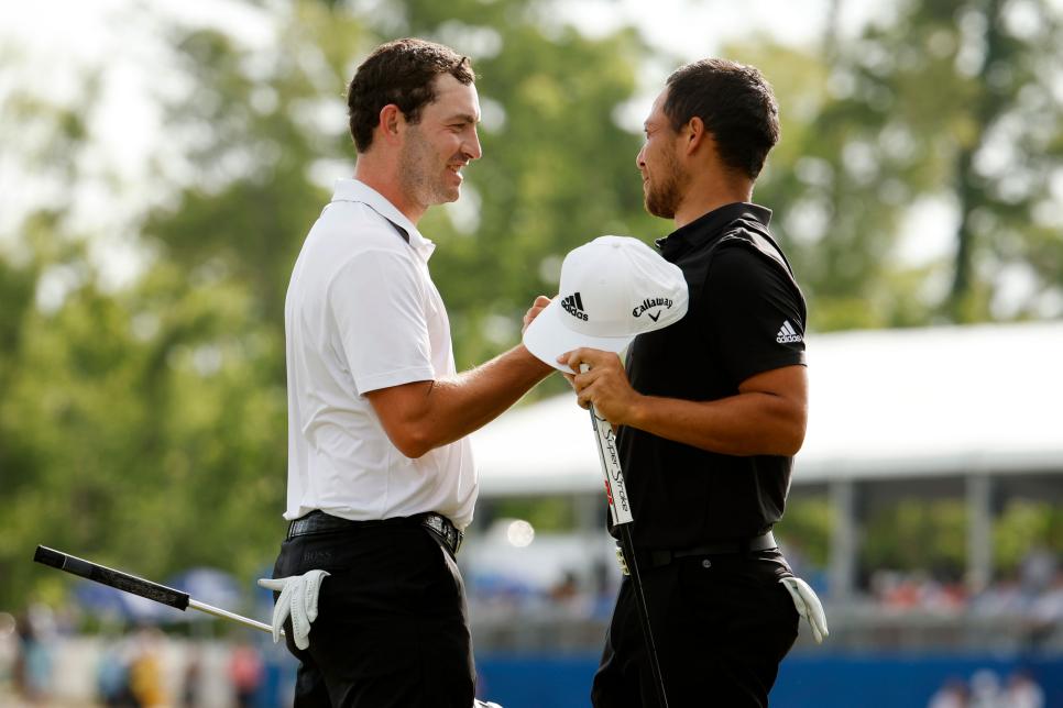 AVONDALE, LOUISIANA - APRIL 24: Xander Schauffele and Patrick Cantlay react after putting in to win on the 18th green during the final round of the Zurich Classic of New Orleans at TPC Louisiana on April 24, 2022 in Avondale, Louisiana. (Photo by Chris Graythen/Getty Images)