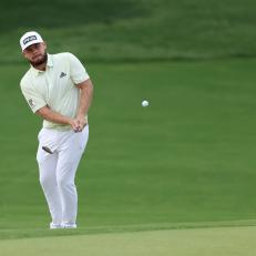 TULSA, OKLAHOMA - MAY 20: Tyrrell Hatton of England chips on the 18th hole during the second round of the 2022 PGA Championship at Southern Hills Country Club on May 20, 2022 in Tulsa, Oklahoma. (Photo by Christian Petersen/Getty Images)