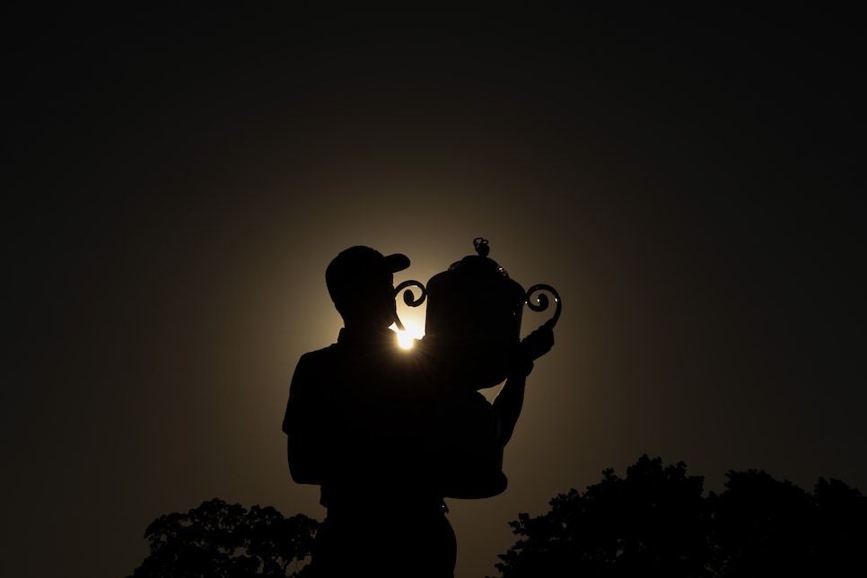 TULSA, OKLAHOMA - MAY 22: Justin Thomas of the United States poses with the Wanamaker Trophy after beating Will Zalatoris in a playoff to win during the final round of the 2022 USPGA Championship at Southern Hills Country Club on May 22, 2022 in Tulsa, Oklahoma. (Photo by Richard Heathcote/Getty Images)