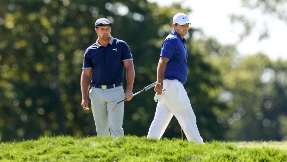 MAMARONECK, NEW YORK - SEPTEMBER 19: Bryson DeChambeau of the United States and Patrick Reed of the United States prepare to putt on the first green during the third round of the 120th U.S. Open Championship on September 19, 2020 at Winged Foot Golf Club in Mamaroneck, New York. (Photo by Gregory Shamus/Getty Images)