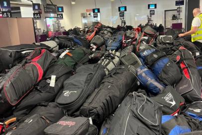 You simply will not believe the massive number of golf bags piled in this Scotland airport