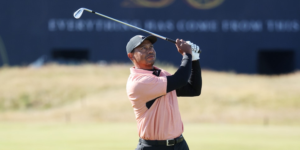 ST ANDREWS, SCOTLAND - JULY 10: Tiger Woods of the United States plays a shot on the third hole during a practice round prior to The 150th Open at St Andrews Old Course on July 10, 2022 in St Andrews, Scotland. (Photo by Warren Little/Getty Images)