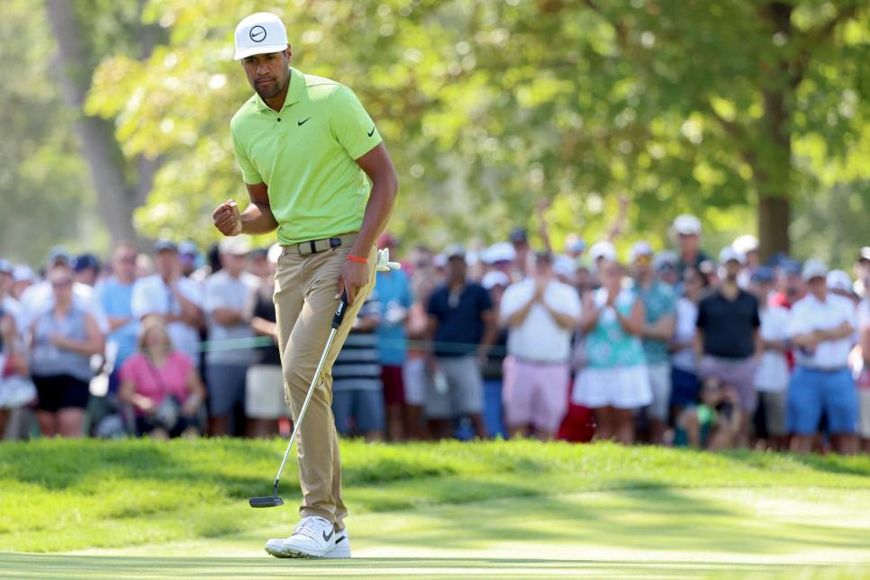 DETROIT, MICHIGAN - JULY 31: Tony Finau of the United States reacts after making par on the ninth green during the final round of the Rocket Mortgage Classic at Detroit Golf Club on July 31, 2022 in Detroit, Michigan. (Photo by Mike Mulholland/Getty Images)