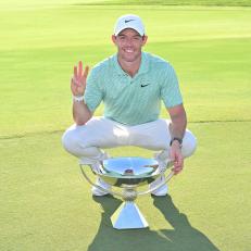 ATLANTA, GEORGIA - AUGUST 28: Rory McIlroy of Northern Ireland holds up three fingers, signifying his third FedEx Cup win, on the 18th green after the final round of the TOUR Championship at East Lake Golf Club on August 28, 2022 in Atlanta, Georgia. (Photo by Ben Jared/PGA TOUR via Getty Images)