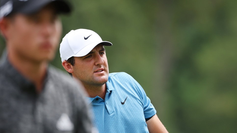 WILMINGTON, DELAWARE - AUGUST 21: Scottie Scheffler of the United States watches his shot from the third tee as Collin Morikawa of the United States looks onduring the final round of the BMW Championship at Wilmington Country Club on August 21, 2022 in Wilmington, Delaware. (Photo by Rob Carr/Getty Images)