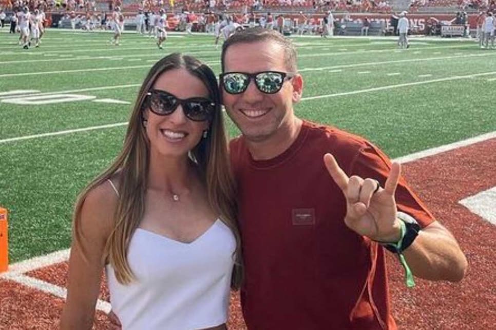 https://www.golfdigest.com/content/dam/images/golfdigest/fullset/2022/9/sergio-garcia-angele-texas-alabama-football-game.jpg