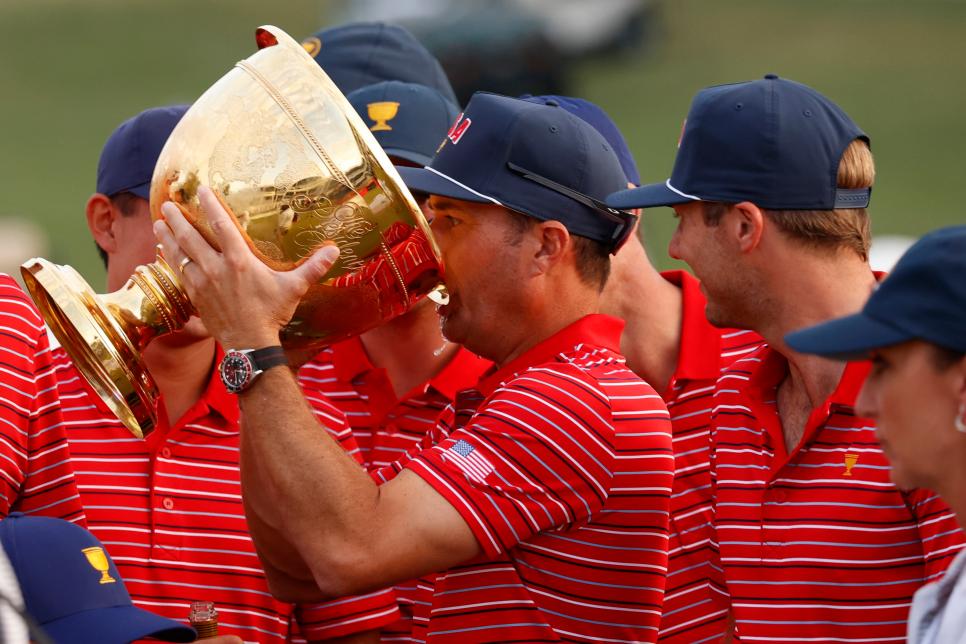 CHARLOTTE, NC - SEPTEMBER 25: USA Presidents Cup golfer Kevin Kisner drinks  Michelob Ultra from the Presidents Cup during the closing ceremony after winning the 2022 Presidents Cup on September 25, 2022 at Quail Hollow Club in Charlotte, North Carolina. (Photo by Brian Spurlock/Icon Sportswire via Getty Images)