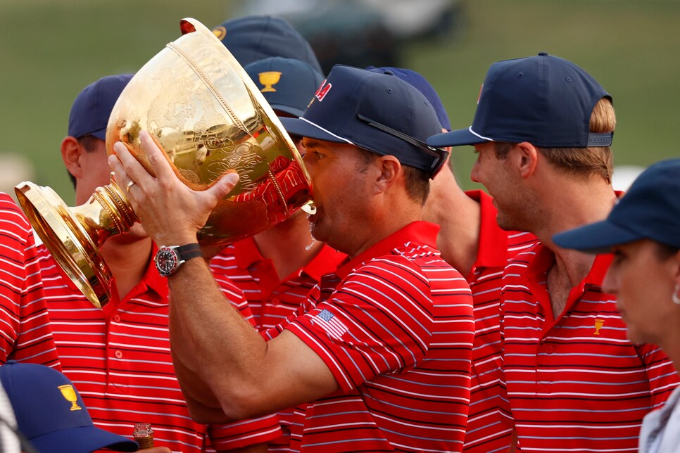 CHARLOTTE, NC - SEPTEMBER 25: USA Presidents Cup golfer Kevin Kisner drinks  Michelob Ultra from the Presidents Cup during the closing ceremony after winning the 2022 Presidents Cup on September 25, 2022 at Quail Hollow Club in Charlotte, North Carolina. (Photo by Brian Spurlock/Icon Sportswire via Getty Images)